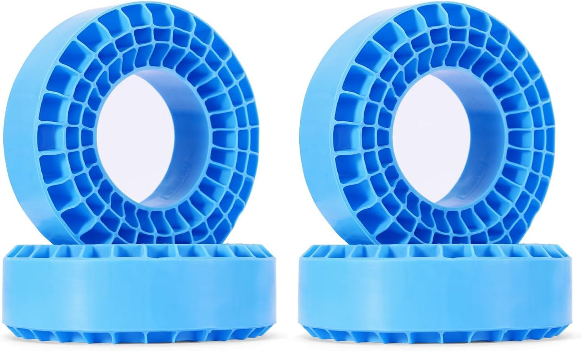 INJORA blue silicone inserts for 106-108mm tires improve stability.