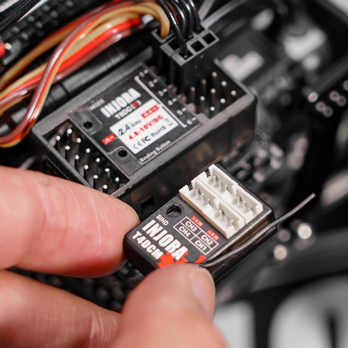 Auto power-off feature of INJORA T6M preserves battery life