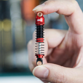 INJORA threaded shock bodies enable quick pre-load and precise damping
