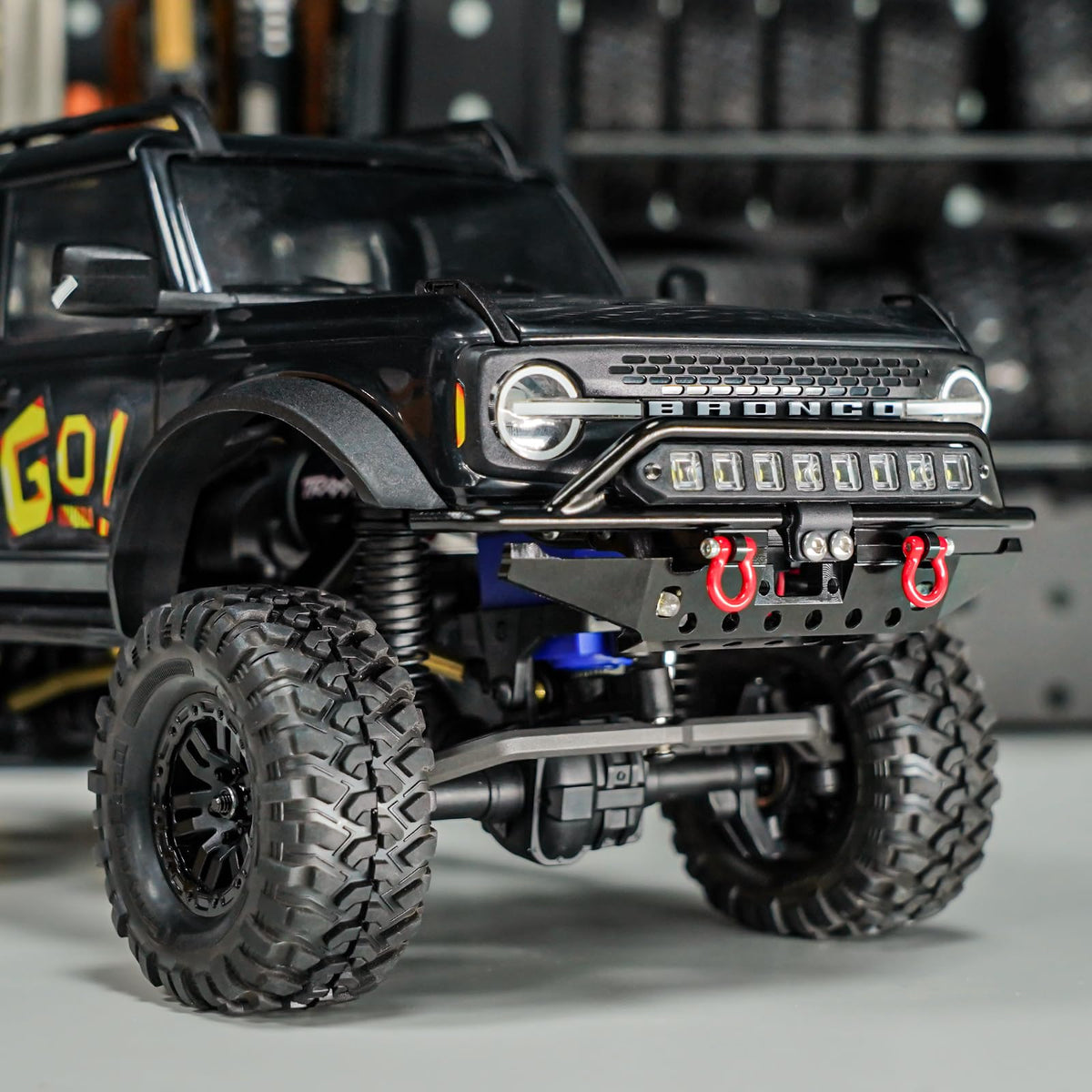 INJORA front bumper LED TRX4M Bronco installed on model for safer night driving.