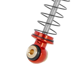 INJORA shocks with two spring options for tuning weight and handling.
