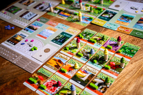 Inside Up Games Earth Abundance expansion neighbor interactions enable you to leverage neighbor tableaus for shared strategy.