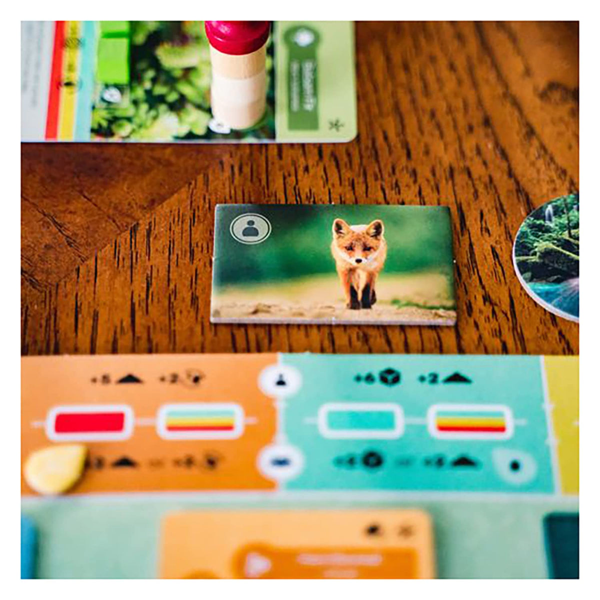 Inside Up Games Earth game pieces arranged for tactile setup