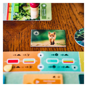 Inside Up Games Earth game pieces arranged for tactile setup