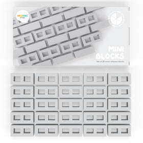 Inspire My Play 25 mini blocks in a sensory bin, encouraging tactile exploration.