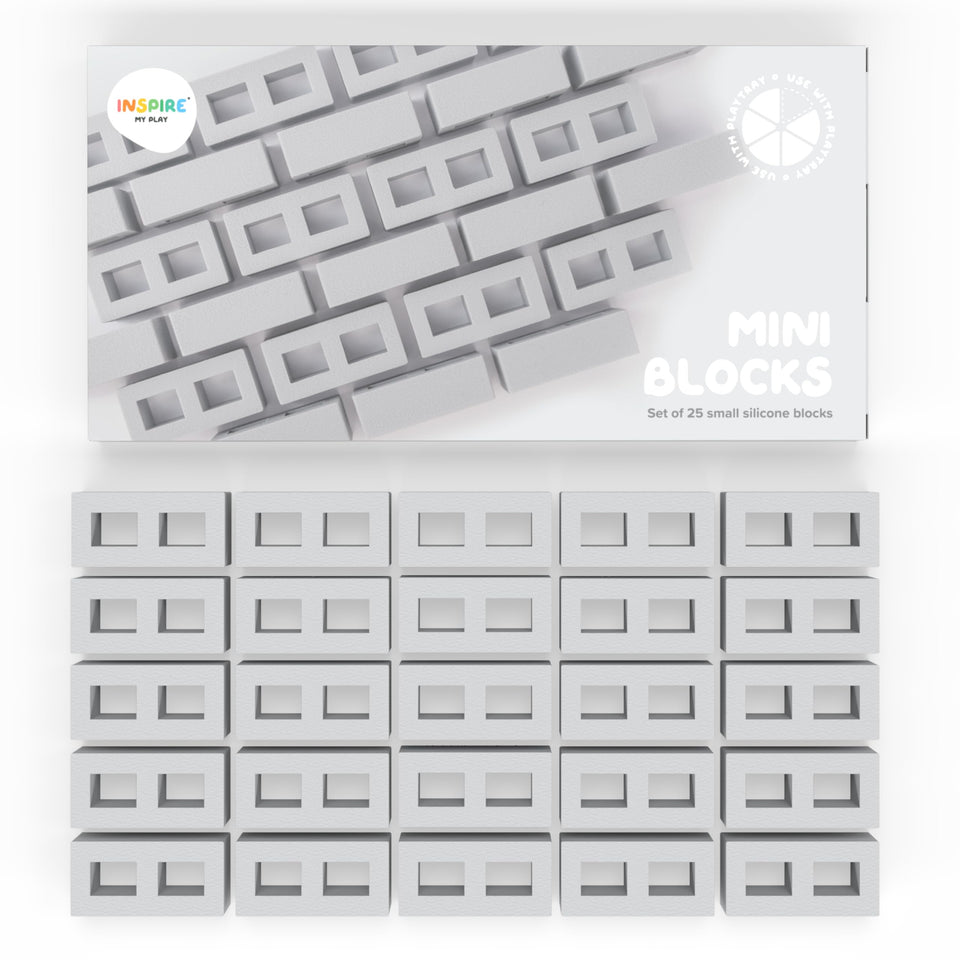 Inspire My Play 25 mini blocks in a sensory bin, encouraging tactile exploration.