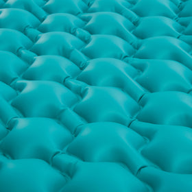 Teal color and sturdy construction enhance poolside ambiance
