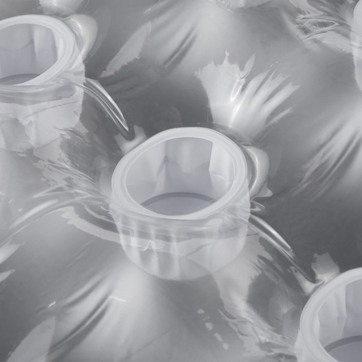 Intex Suntanner Lounge drink pockets provide easy access on the float