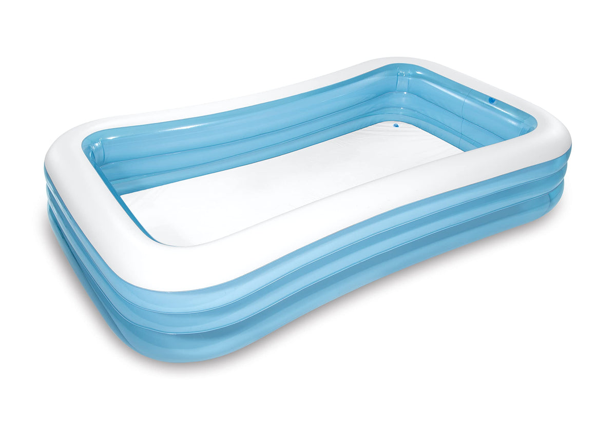 Intex Swim Center pool filled with water for family fun in the backyard.