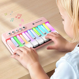 iPlay iLearn kids mini piano with rainbow lights in pocket size for travel play.