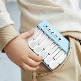 iPlay iLearn portable travel piano ideal for car rides and trips.