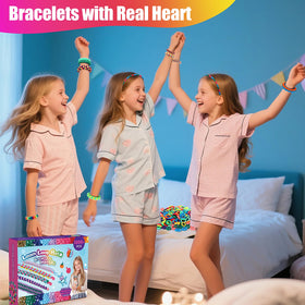 Children crafting bracelets and necklaces with IQBOX bands