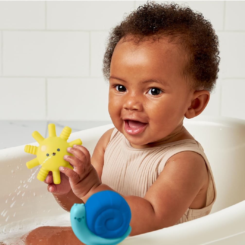 Itzy Ritzy bright colors support visual tracking during playful bathtime.