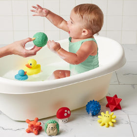 Itzy Ritzy colorful bath shapes for imaginative play and sensory stimulation.