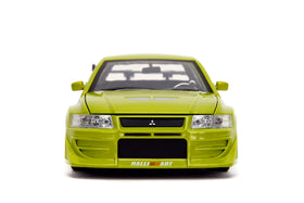 Jada Brian's Mitsubishi Lancer Evo VII features premium rubber tires for authentic feel.