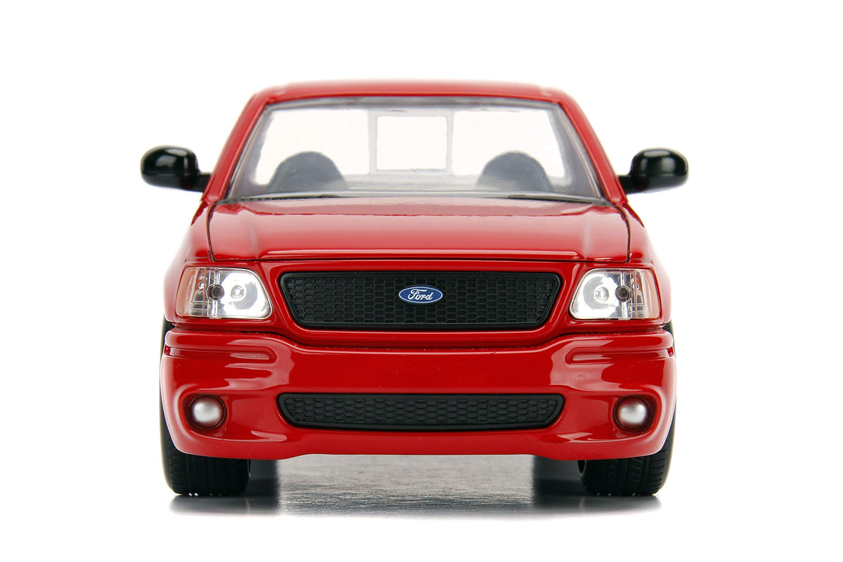Jada Brian's Ford F-150 SVT Lightning open hood detail for inspection