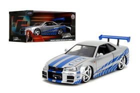 Jada Fast & Furious Brian's Nissan Skyline R34 1:24 model, display-ready with silver-blue finish.