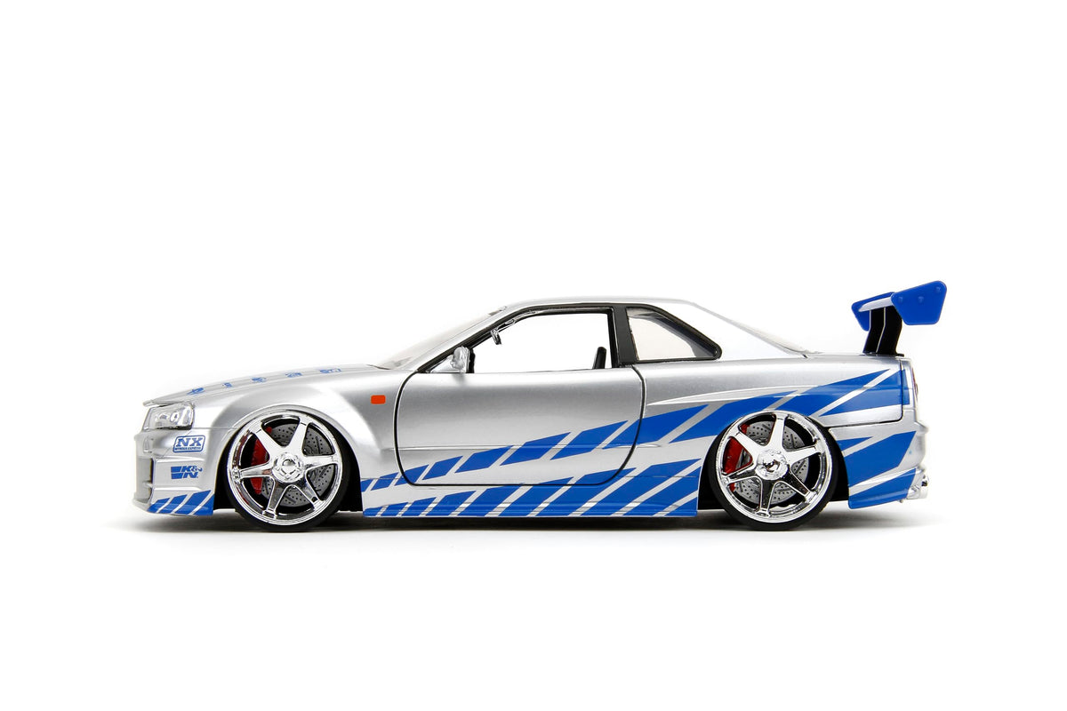 Chrome wheels and aerodynamic styling on Jada Nissan Skyline R34 1:24.