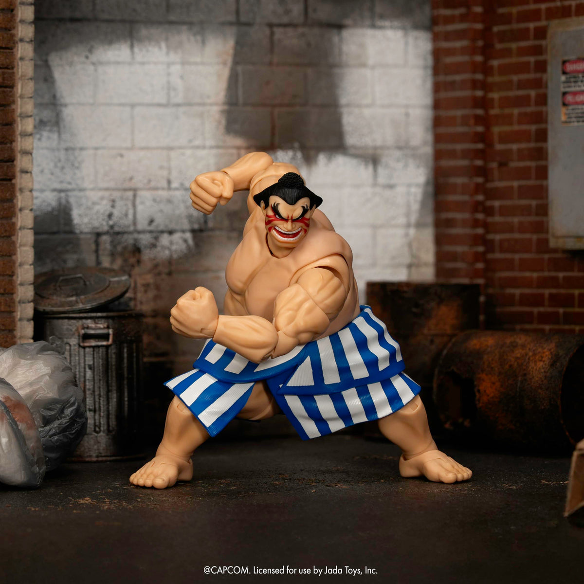 Jada E. Honda figure with interchangeable heads and hands supports expressive setups