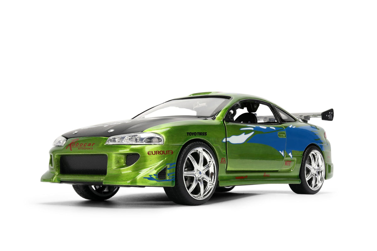 Jada Toys chrome wheels and sculpted wing enhance the car's street-ready vibe.