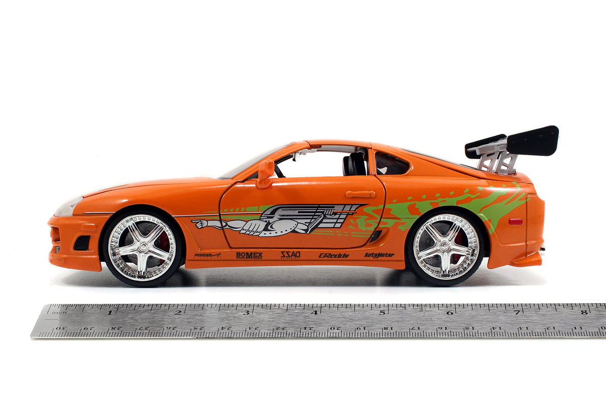 Jada Toys Brian's Toyota Supra engine compartments reveal model depth.