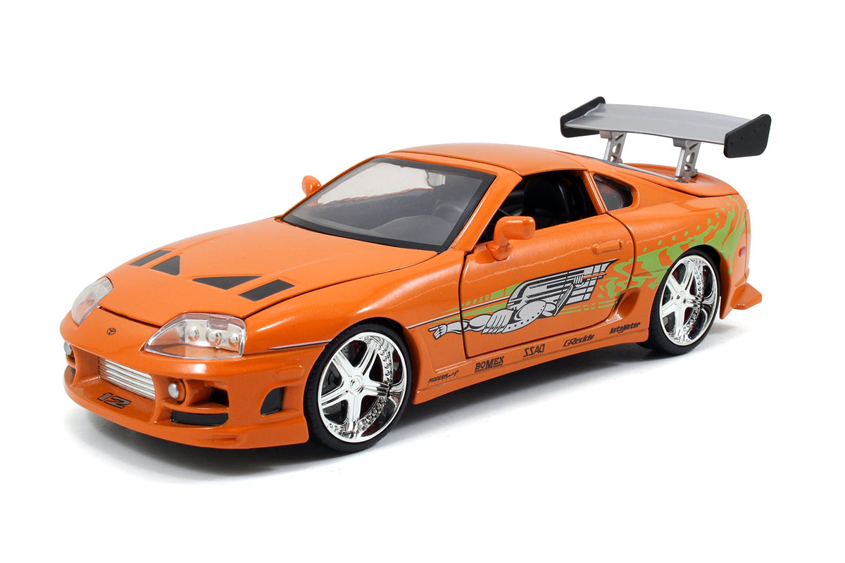Jada Toys Brian's Toyota Supra opening doors for interactive display.
