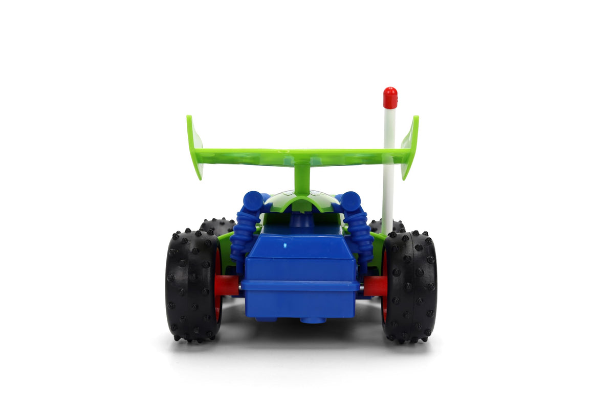 Children playing with Jada Toys RC Buggy in a cozy room.