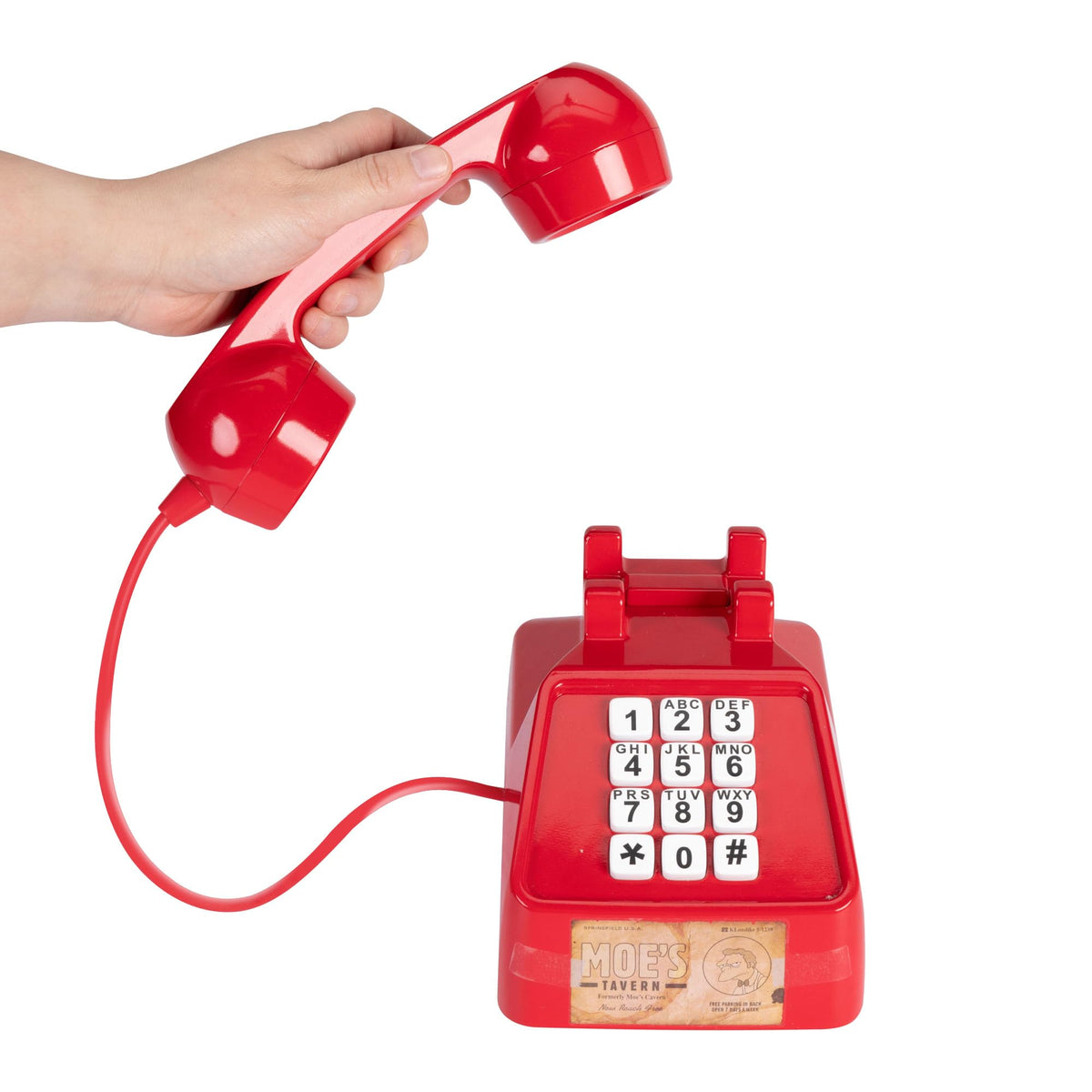 JAKKS Moe's Prank Phone dial pad close-up showing classic design
