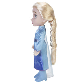 Doll side view showcases graceful pose and manufacturing quality.