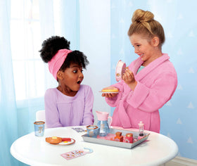 Disney Princess plate cover lifting to reveal a pretend meal during play.