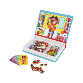 Janod MagnetiBook child playing with magnetic outfits in a book-style case.