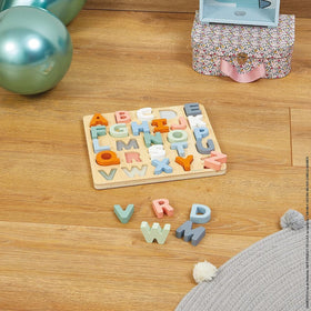 Janod Sweet Cocoon compact wooden tray organizes letters and pieces neatly.