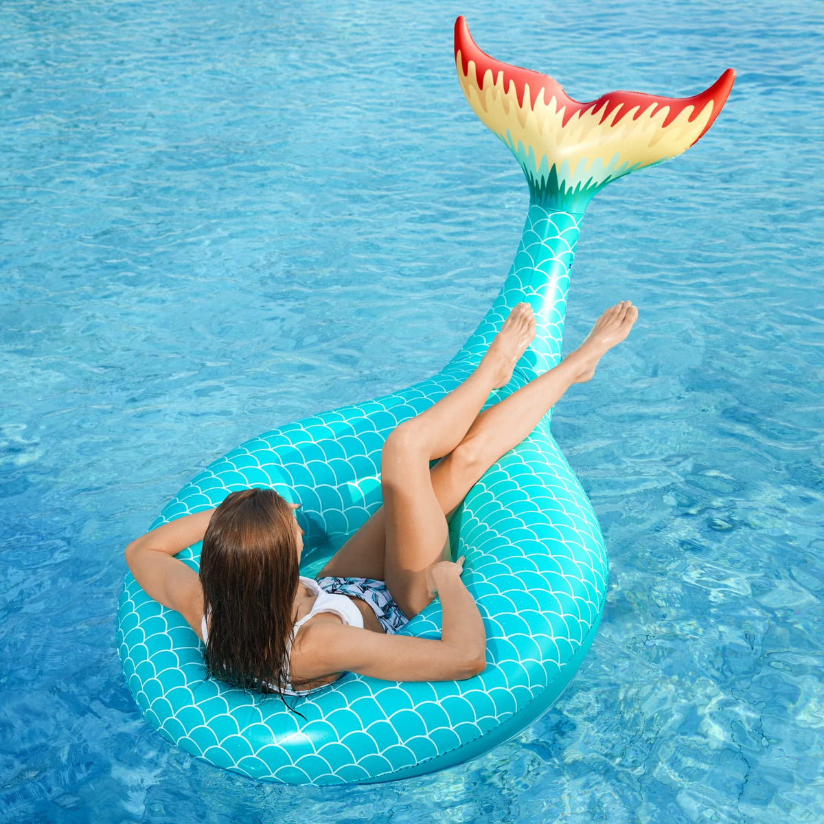 Jasonwell Mermaid Tail pool float serves as a versatile outdoor photography prop.