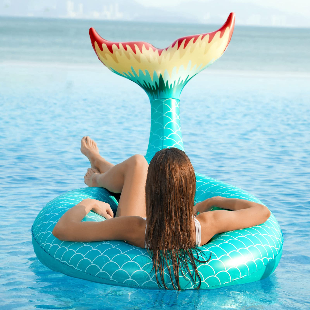 Jasonwell mermaid tail pool float with soft raft-grade vinyl for comfort.