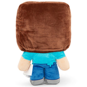 Jay Franco Minecraft Steve pillow buddy in bed setup, playful character addition.