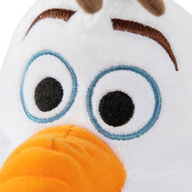 Pillow buddy Olaf beside a car seat for travel comfort