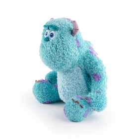 Jay Franco Sully plush on bed as a comforting nighttime companion.