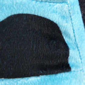 Jay Franco Monster Jam Megalodon pillow in bed, a sleeping buddy for kids.