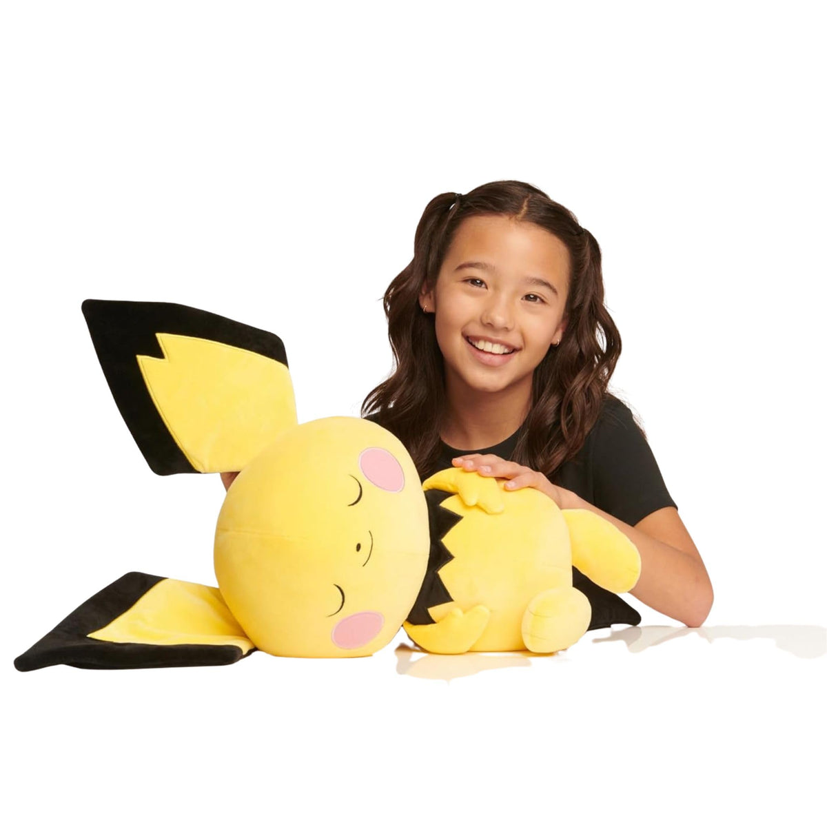 Jazwares Pokémon Pichu sleeping plush 18-inch cuddly bedtime companion.