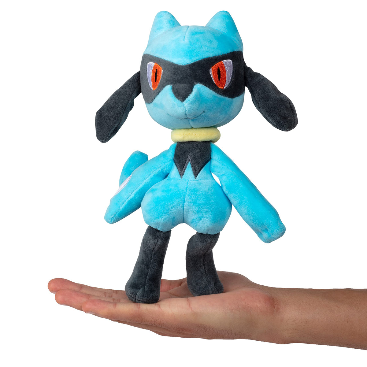 Jazwares Pokémon Riolu Plush in-hand view shows scale and cuddliness