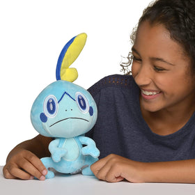 Jazwares Sobble Plush in hand demonstrates squeezable softness for hugs.