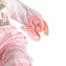 JC Toys Berenguer baby bottle included for pretend feeding.