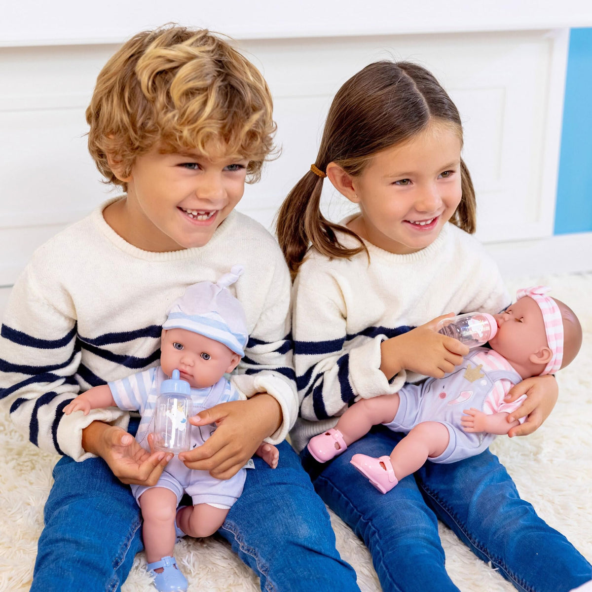 Berenguer Boutique 15-inch doll in gift-set outfits invites dressing play.