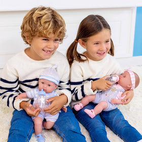 Berenguer Boutique 15-inch doll in gift-set outfits invites dressing play.