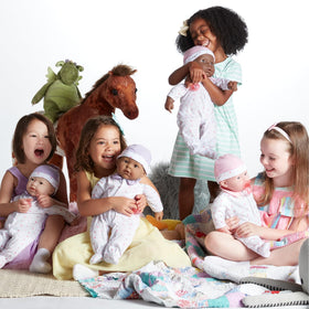 JC Toys La Baby removable hat adds dress-up options for imaginative play.