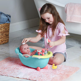JC Toys hooded towel keeps doll cozy after bath