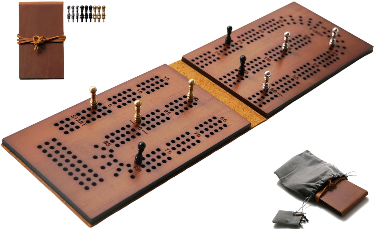 Jeereal travel cribbage board with leather cover and bamboo surface, compact for on-the-go play.
