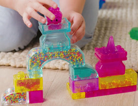 Kids playing with Jelly Blox Classic Castle Set for cooperative, creative play.