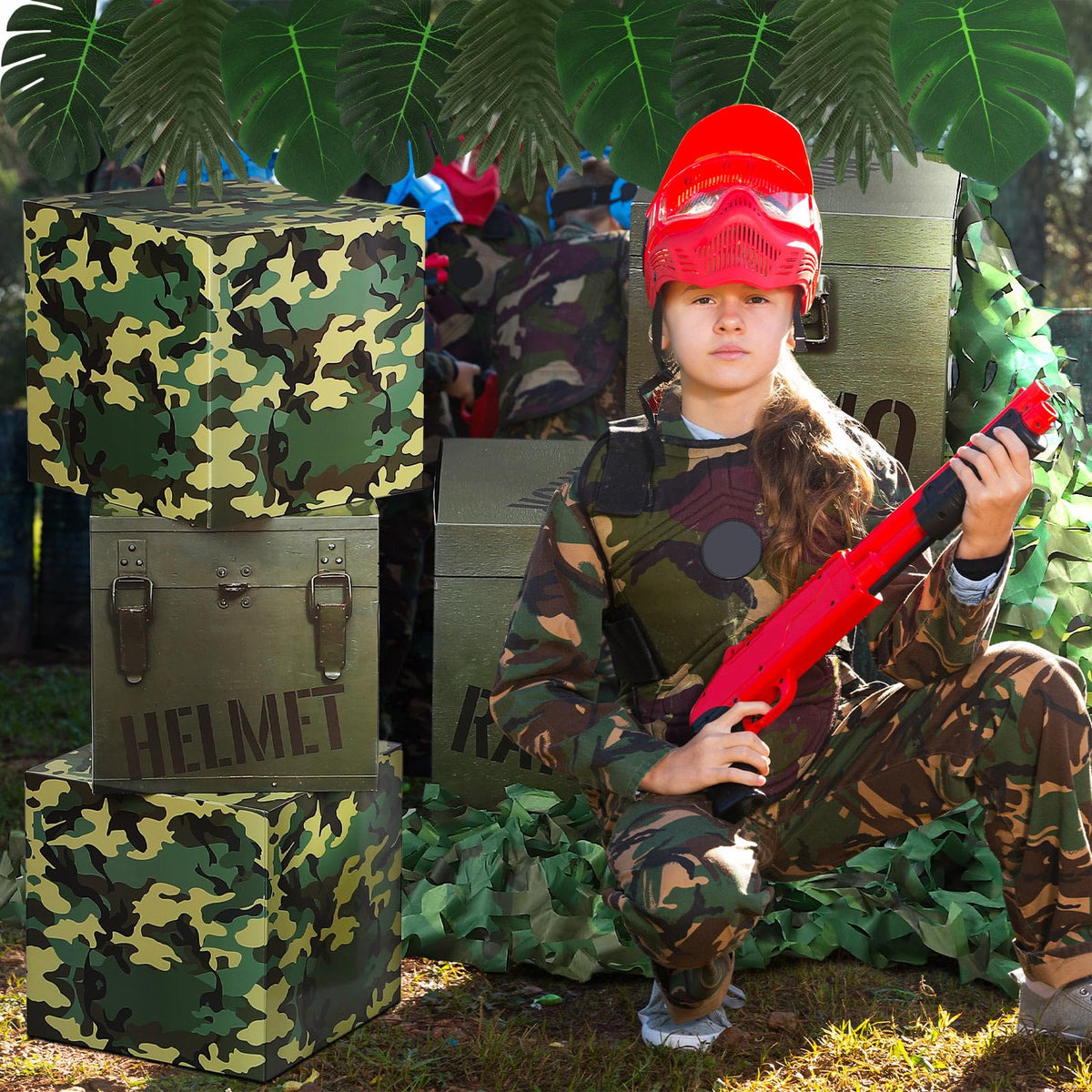 JellyArch jungle party photo booth backdrop with camo accents.