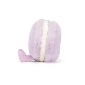 Jellycat Amusables May Macaron close-up eye, showcasing soft plush fabric.